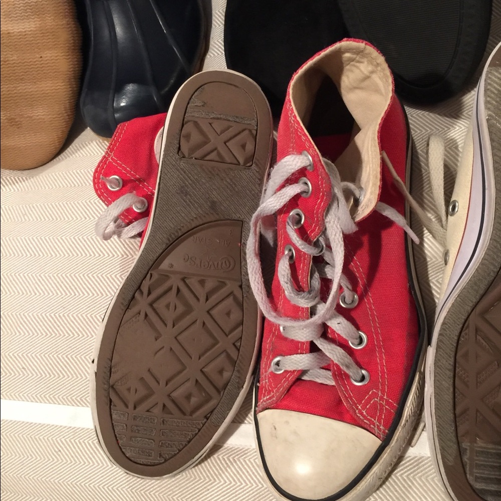 Red high top Chuck Taylor